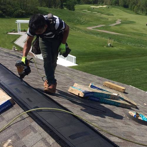 roofer installing a roof